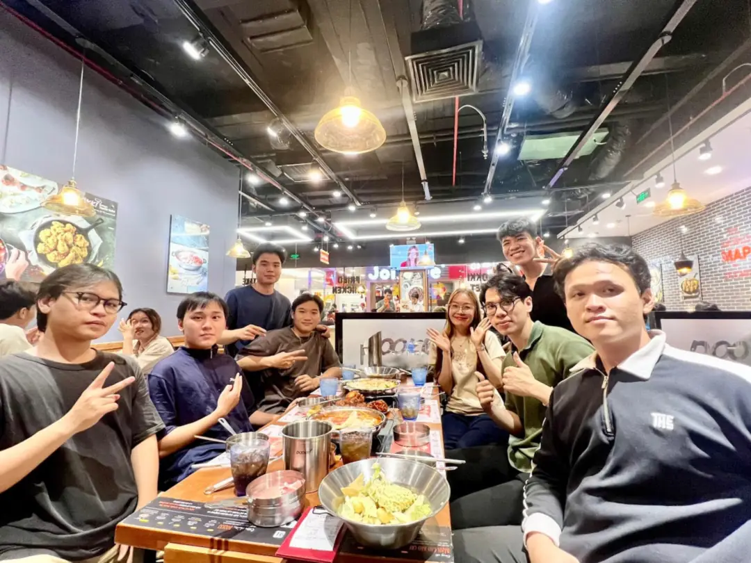 The squad sharing a meal together at a restaurant